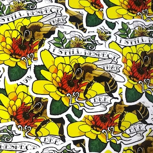 May include: A collection of stickers featuring a bee on a yellow and red flower. Each sticker has the text "I STILL RESPECT THAT BEE" on a banner. The bee is detailed with black and yellow stripes.