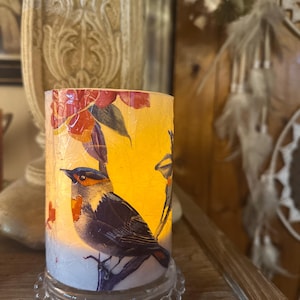 4 inch tall Blue Bird and floral textured indoor/outdoor flameless LED candle w/ on/off switch and built in timer included free Shipping