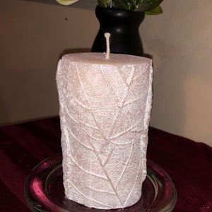 Silver white leaf pillar candle scented with peppermint and vanilla essential oil’s