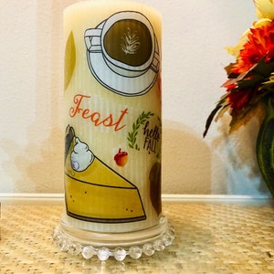 6 inch tall Hello Fall-feast pillar candle with Vanilla butter cream fragrance