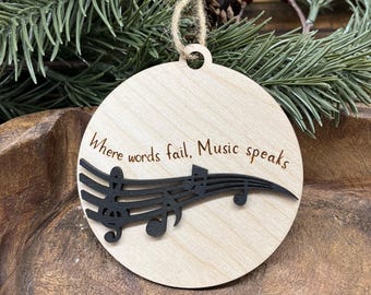 Where words fail music speaks ornament, music notes