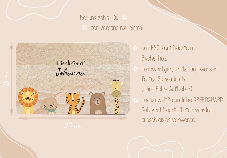 May include: A personalized wooden cutting board with a light wood finish. The board features a cute illustration of a lion, rabbit, tiger, bear, and giraffe. The text "Hier kr&uuml;melt Johanna" is printed on the board. The board measures 23 cm by 15 cm.