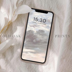 Pode incluir: A tela de um telefone mostrando um relógio digital com a hora 15:30 e a data de sexta-feira, 10 de dezembro. O fundo é uma pintura de um céu nublado com um toque de pôr do sol.