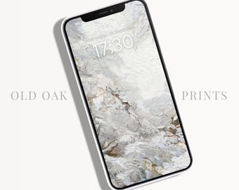 Peut inclure: Un iPhone blanc avec un fond abstrait gris et l'heure 17:30 affichée à l'écran.