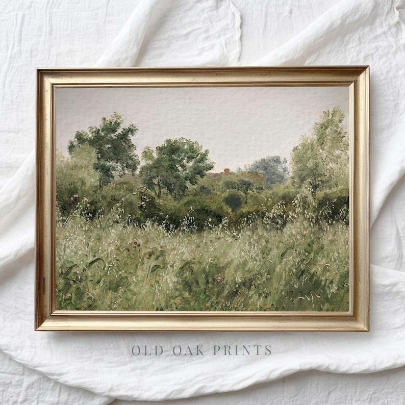 May include: A framed painting depicting a landscape with a field of tall grass and trees in the background. The painting is in a gold frame and features a muted colour palette.
