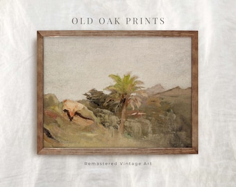 Puede incluir: Una pintura vintage de una palmera en un paisaje desértico. La pintura está enmarcada en un marco de madera marrón. La pintura se titula "Old Oak Prints" y tiene el texto "Remastered Vintage Art" debajo del marco.