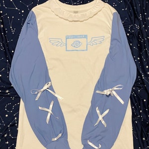 Tenshi Kaiwai kawaii biblically accurate angel lace up sleeves cybercore blue and white long sleeve shirt