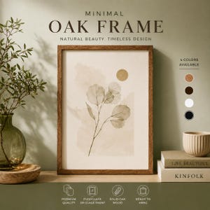 May include: A rectangular wooden picture frame containing a print of a botanical illustration with leaves and a circle. The text reads MINIMAL OAK FRAME, NATURAL BEAUTY, TIMELESS DESIGN, 4 COLORS AVAILABLE, LIVE BEAUTIFUL, KINFOLK, PREMIUM QUALITY, PLEXIGLASS OR GLASS FRONT, SOLID OAK WOOD, READY TO HANG.