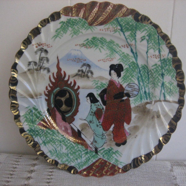 Japanese Kutani Geisha Girls Moriage Fluted Plate Hand Painted Porcelain Black Gold Rim Signed