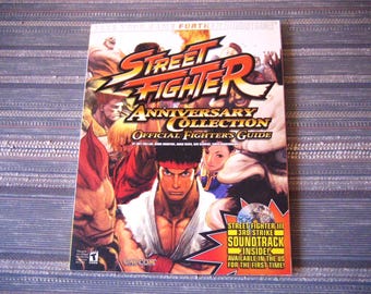 Street Fighter Official Strategy Guide Anniversary Collection By BradyGames, Paperback Magazine With Soundtrack Included Used But Like New