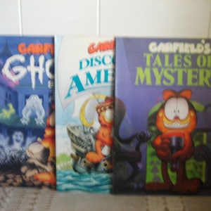 Vtg Garfield Softcover Books, Garfield Discovers America, Garfields&#39; Ghost Stories, Garfield&#39;s Tales of Mystery, Garfield Books by Jim Davis