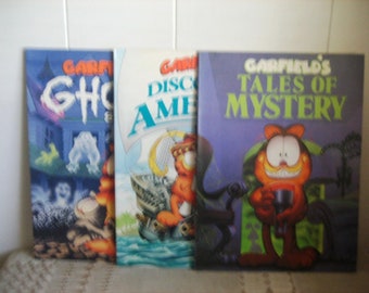Vtg Garfield Softcover Books, Garfield Discovers America, Garfields' Ghost Stories, Garfield's Tales of Mystery, Garfield Books by Jim Davis