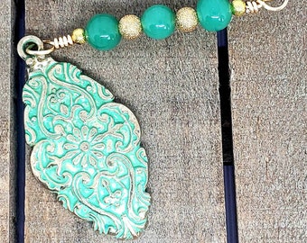 Light green flower burst pendant purse charm