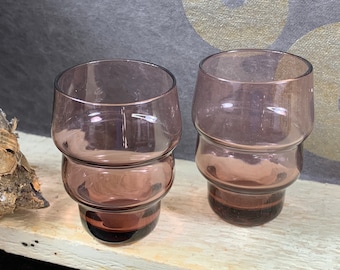 Two striking retro shot glasses - vodka shot - in colored glass