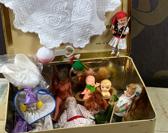 Tin box filled with 18 played with small dolls and toys - Tweety - porcelain doll