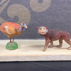 Vintage zoo animals – monkey and bird – hand-painted massage toys – probably Lineol or Elastolin – 1940s