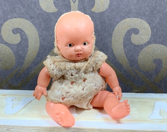 Old, played-with, marked celluloid doll - Made in Occupied Japan