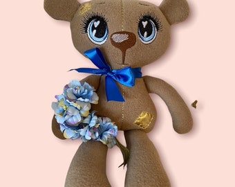 Personalized soft bear.  You can order the name of the embroidery.