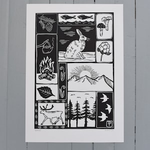 May include: Black and white linocut print featuring a grid of images depicting nature scenes, including a rabbit, a reindeer, a campfire, a pine cone, a mountain range, and birds. The print is signed "P" and dated "2019".