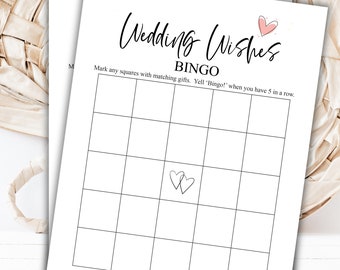 Może przedstawiać: Drukowana karta bingo ślubna z czarno-białą siatką i tekstem "Wedding Wishes Bingo" u góry. Tekst "Mark any squares with matching gifts. Yell 'Bingo!' when you have 5 in a row." znajduje się pod tytułem.