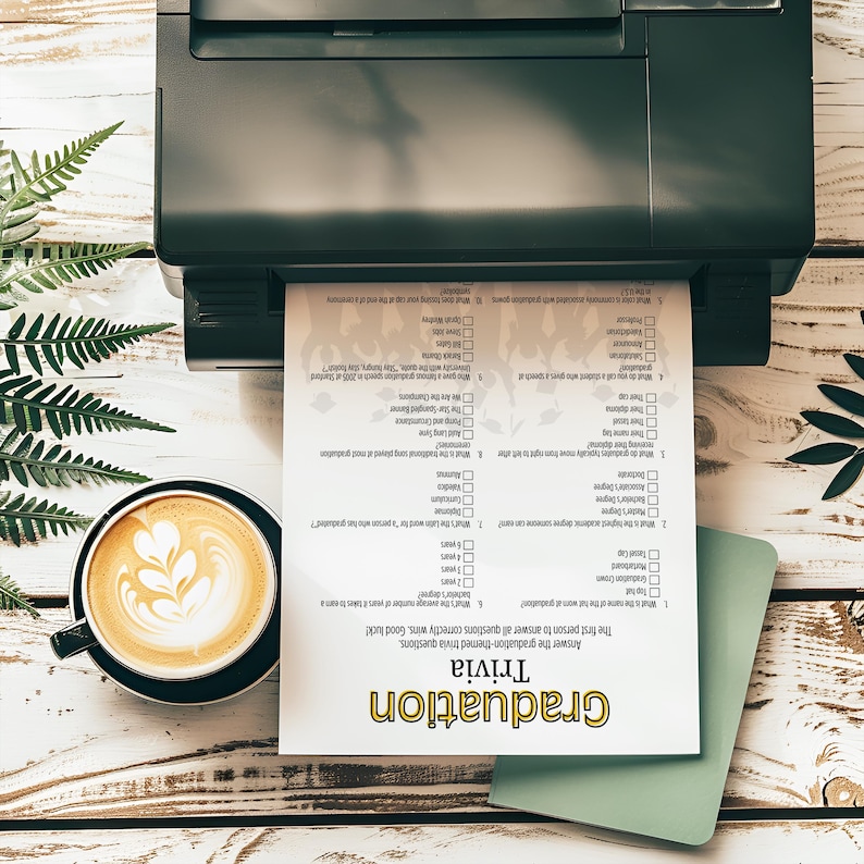 May include: A printable graduation trivia game with questions about graduation traditions. The game is printed on white paper with black text and a yellow title bar.