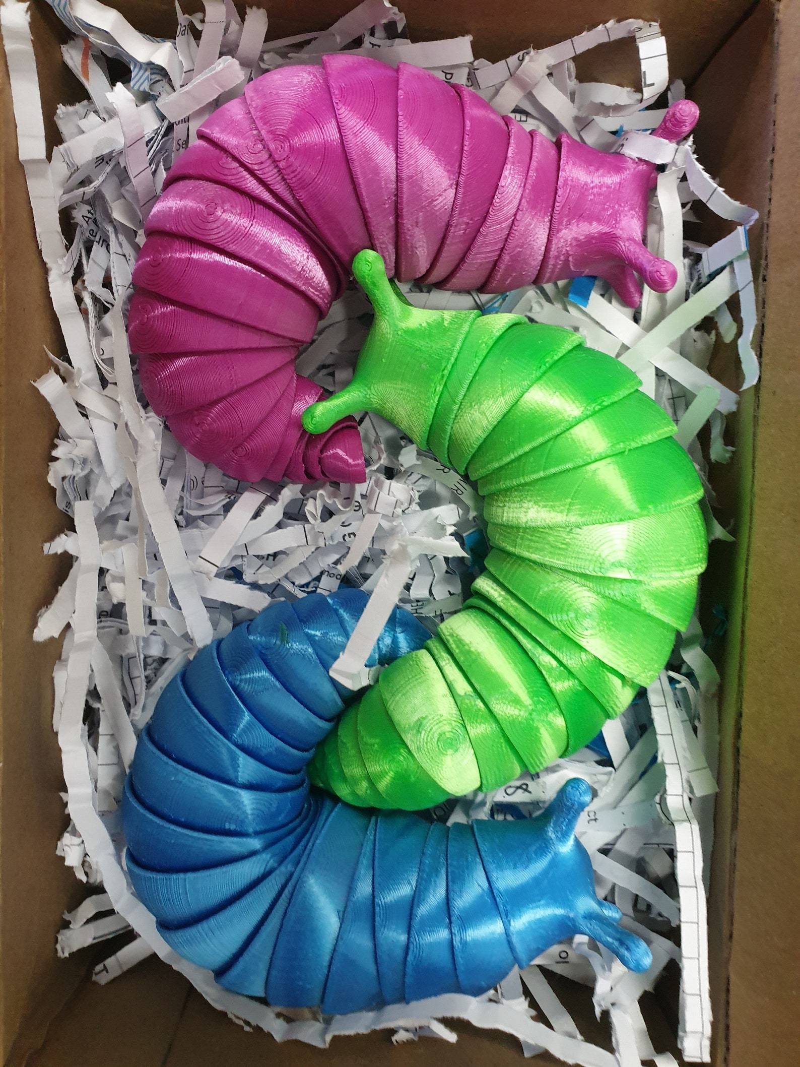 articulated slug fidget toy