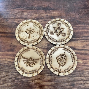 Nintendo&#39;s Legend Of Zelda Themed Coasters With Different Styled Wood