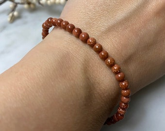 4mm Goldstone Beaded Bracelet | Polished Goldstone Gemstone Bead Stretch Bracelet | Shop Orange Metaphysical Crystal Jewelry