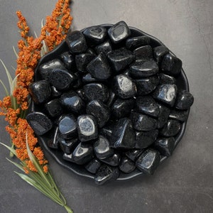 Nuummite Tumbled Stones | Polished Nuummite Crystal Gemstones | The Sorcerer&#39;s Stone | Shop Black Metaphysical Crystals for Root Chakra