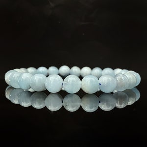 Aquamarine Beaded Bracelet | 6-8mm Polished Aquamarine Gemstone Bead Stretch Bracelet | Shop Metaphysical Crystal Jewelry for Throat Chakra