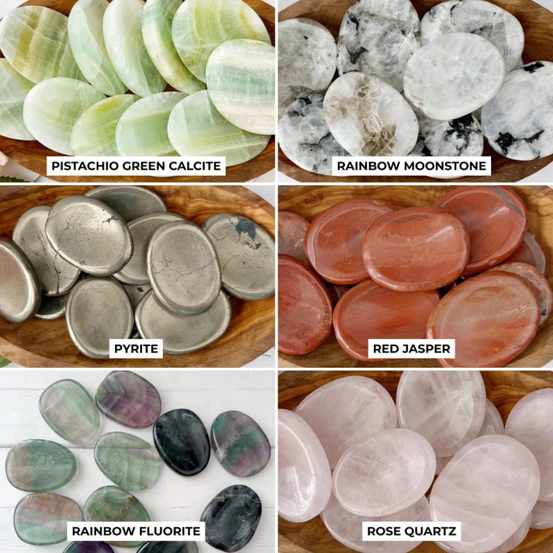 May include: A collection of polished gemstones, including pistachio green calcite, rainbow moonstone, pyrite, red jasper, rainbow fluorite, and rose quartz. Each stone is oval-shaped and displayed in a wooden bowl. Text labels identify each stone type.