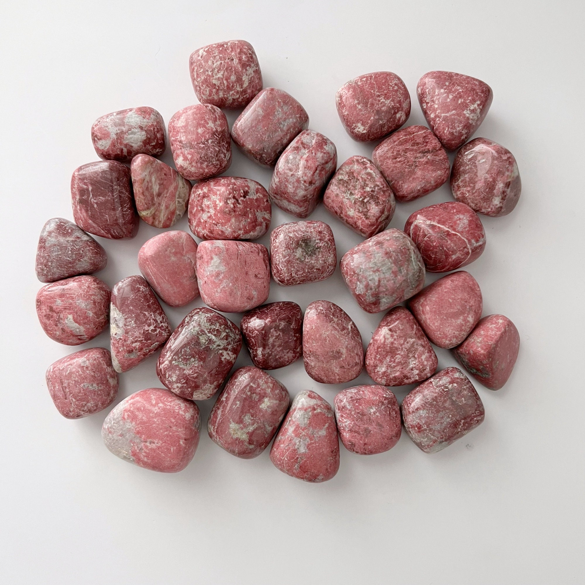 Thulite Tumbled Stones | Polished Thulite Crystal Gemstones Thulite Tumbled Stones | Polished Thulite Crystal Gemstones