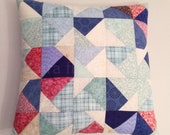Modern patchwork pillow in pink, blue and more
