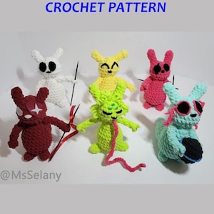 May include: Six crocheted plush toys in different colors and designs. The toys are all in the shape of cats with different facial expressions and accessories. The toys are arranged in a circle on a white background. The text "6-in-1 Squeakcats CROCHET PATTERN" is at the top of the image. The text "@MsSelany" is at the bottom of the image.