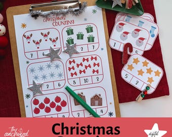 May include: A printable Christmas counting activity worksheet with images of reindeer, gift boxes, snowflakes, bows, ornaments, gingerbread houses, and candy canes. The worksheet has a title that says "Christmas Counting".