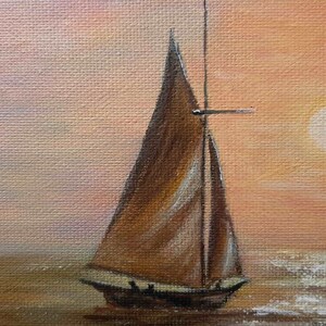 May include: A painting of a sailboat with brown sails on a body of water at sunset. The sun is a white circle in the orange sky.
