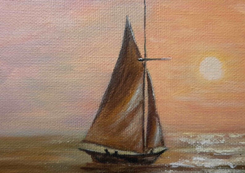 May include: A painting of a sailboat with brown sails on a body of water at sunset. The sun is a white circle in the orange sky.