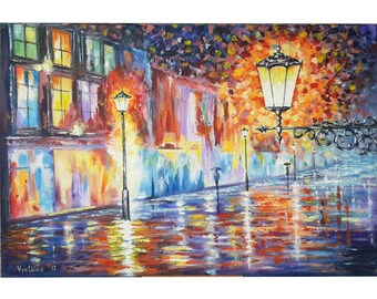 May include: A painting of a city street at night with streetlights and reflections in the wet pavement. The buildings are brightly lit with warm colors, and the sky is a dark blue with hints of purple and orange. The painting has a whimsical and romantic feel.