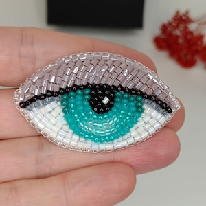 Böser Blick Brosche Perlenbrosche grün blaues Auge Gestickte Brosche