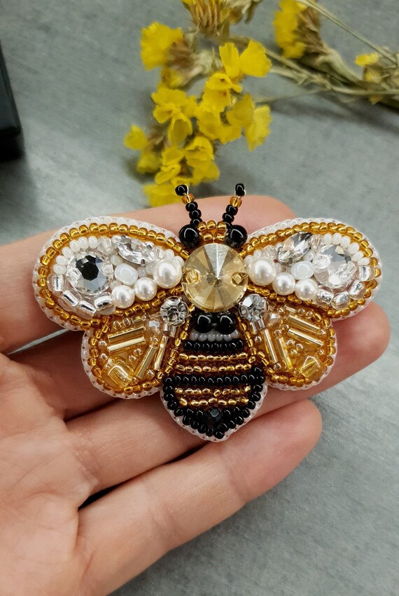 Bug brooch deals