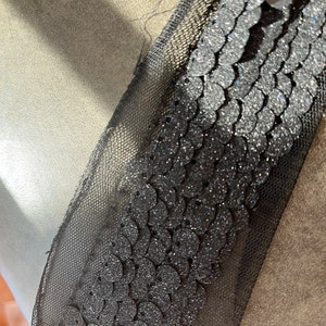 Black matte sequin with glitter in black netting ,1 yard, 621