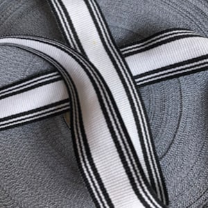 Reversible sporty , Athletic , white and black stripe trim 1 yard, 1&quot; wide, 338
