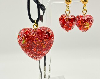 The Alchemy Taylor-inspired Heart Earring and Necklace set with 24 inch black chord gifts for swifties chiefs fans football