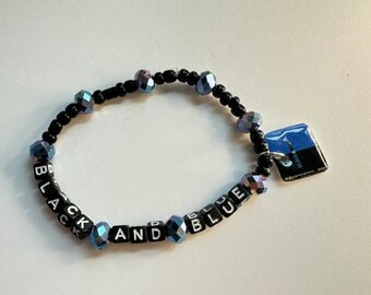 Black and Blue friendship charm bracelet | 7 inch stretchy | Back | Concerts | Street | Boy Bands | AJ | Alex | Pop Music |