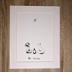 Charlie Mackesy gemonteerde print - Be Curious - The Boy, The Mole, The Fox and The Horse boekpagina kunst