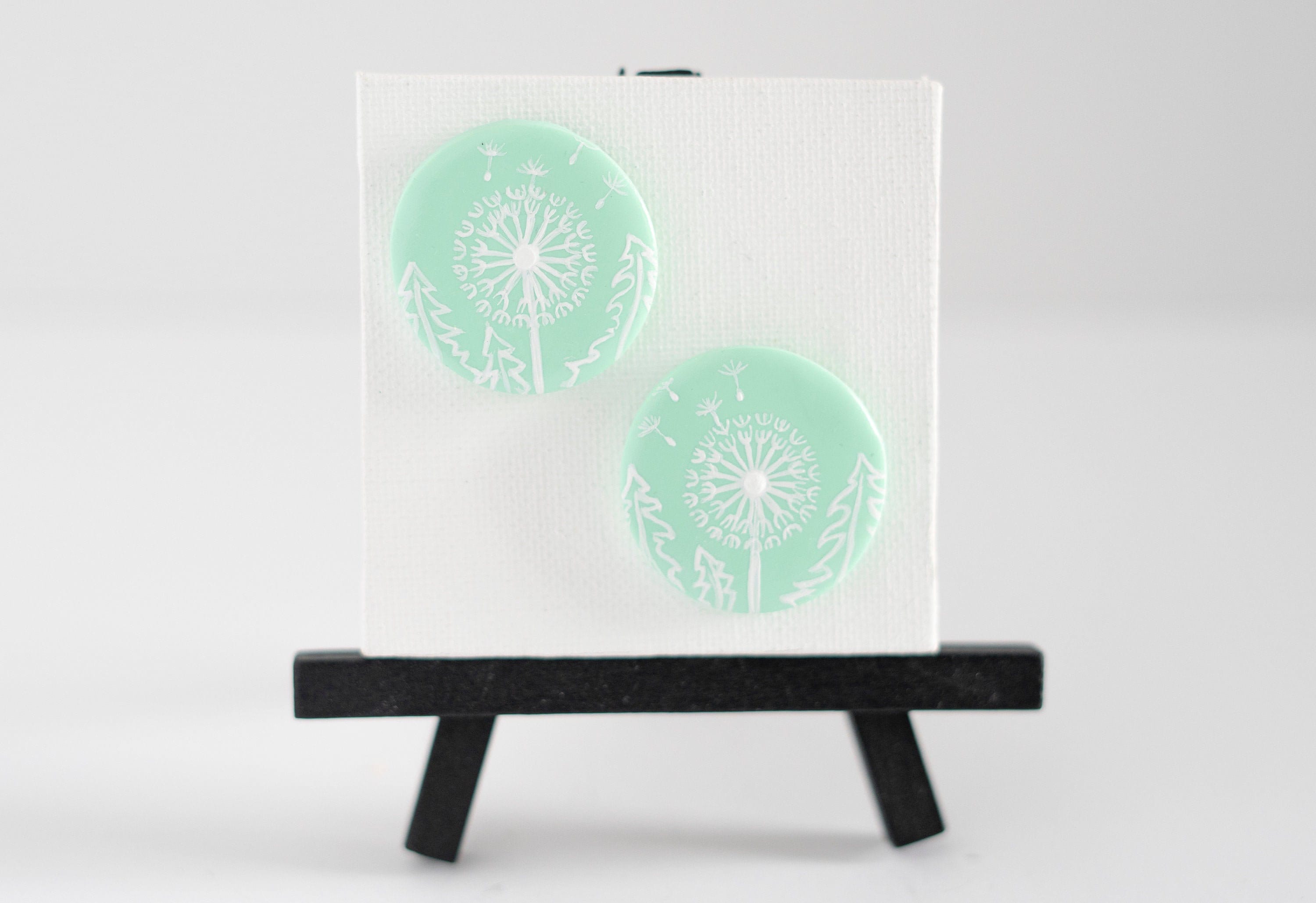 Hand Painted Mint Green Dandelion Medallion Earrings. Round Hand