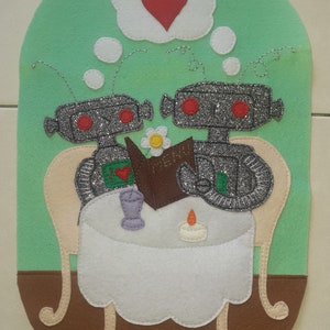 May include: Two silver robots with red eyes are sitting at a table with a white tablecloth. The table has a candle, a glass, and a brown menu with a flower on it. The robots are looking at the menu and there is a thought bubble above them with a red heart.