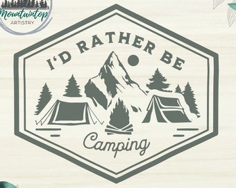 May include: A green hexagonal badge with the text "I'd rather be camping" in white. The badge features a mountain range, two tents, a campfire, and a sun. The text "Mountaintop Artistry" is in a circle at the top of the badge.
