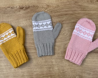 Teenager mittens, in a lovely fair isle design.  In a choice of three colours to keep you warm this winter. Also in plain Black or Navy