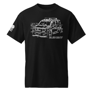 May include: Black t-shirt featuring a white line drawing of a car with the word "ELEMENT" below the car. The left sleeve has a small American flag design.
